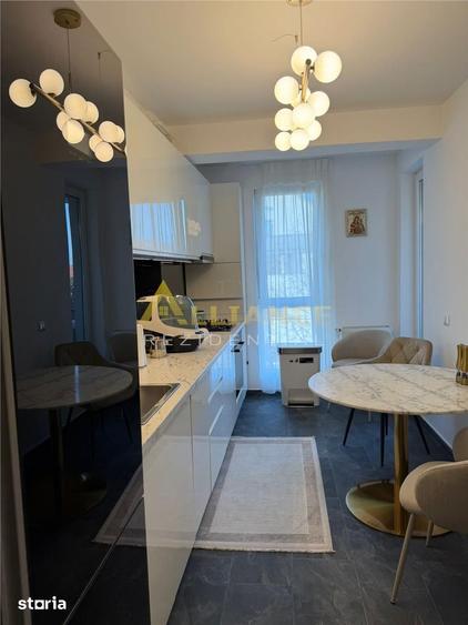 Apartament cu 3 camere decomandat, mobilat în Central — fotografia 1