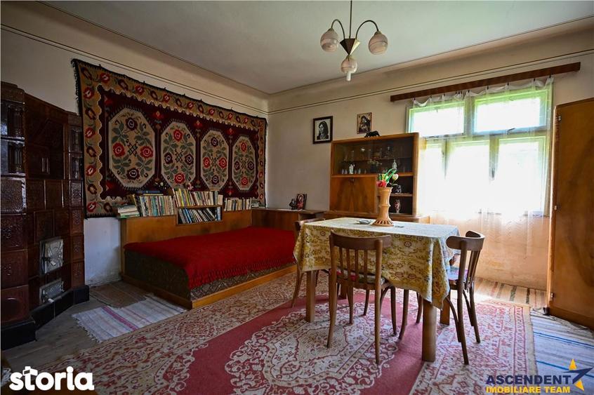 Casă cu 2 camere decomandat cu Teren 4300 Mp în Bran