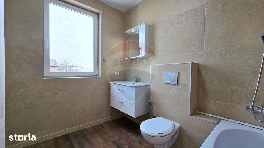 Casă cu 4 camere cu Teren 187 Mp în Tunari