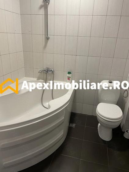 Apartament cu 3 camere semidecomandat, mobilat în Titan