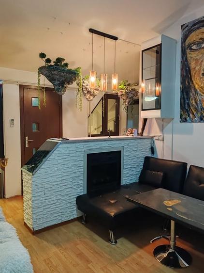 Apartament cu 3 camere semidecomandat, mobilat în Ozana