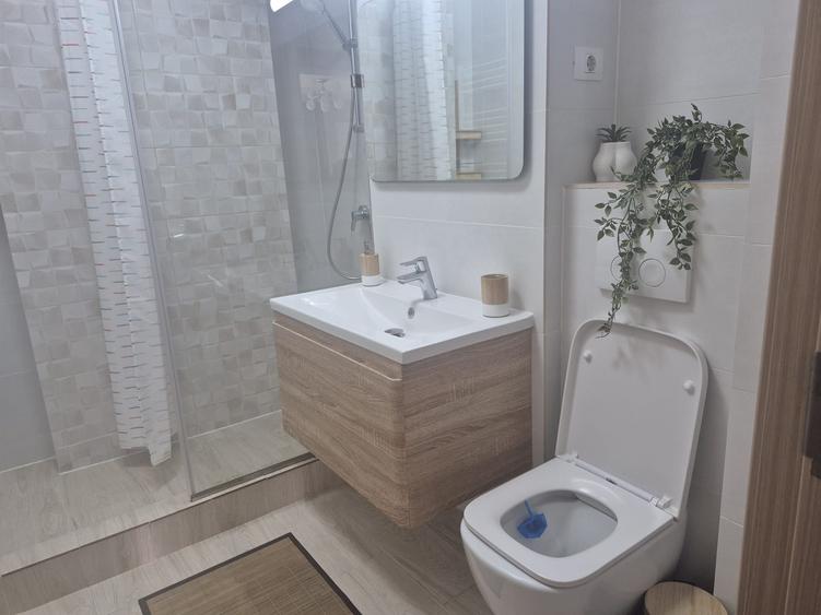 Apartment de inchiriat pe termen lung / zona Butoaie, vedere bilaterala lac / mare - 1