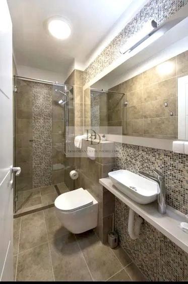 Apartament cu 3 camere semidecomandat, mobilat în Central