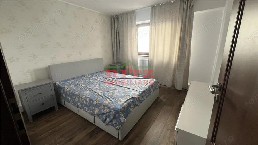 Apartament cu 3 camere decomandat în