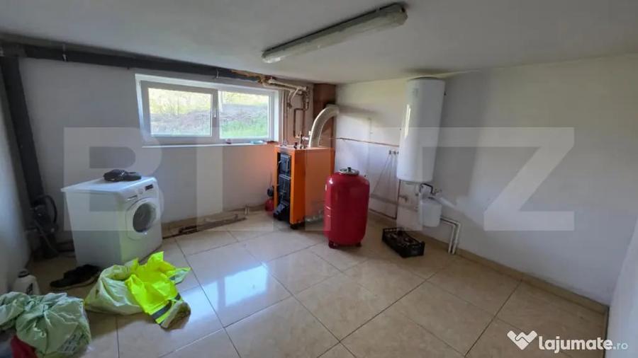 Casă cu 4 camere cu Teren 1000 Mp în Central