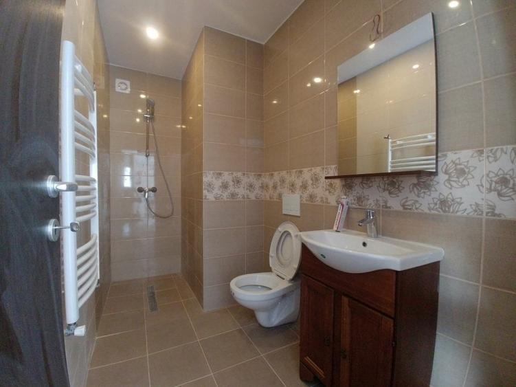 Casă cu 4 camere cu Teren 330 Mp în Tunari