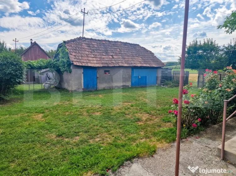 Casă cu 2 camere cu Teren 8290 Mp în Iclod