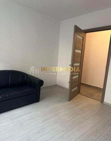 Apartament cu 2 camere semidecomandat, mobilat în Central