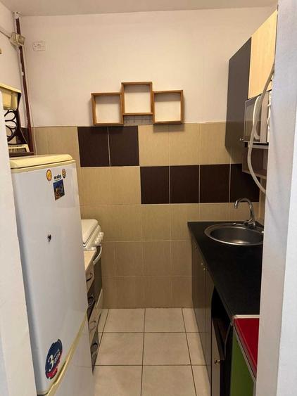 Garsonieră decomandată în Costin Georgian