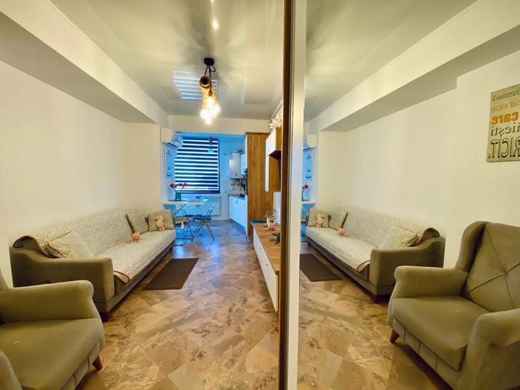 Apartament cu 2 camere semidecomandat, mobilat în Central