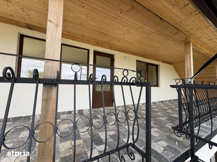 Casă cu 4 camere cu Teren 1000 Mp în Holboca