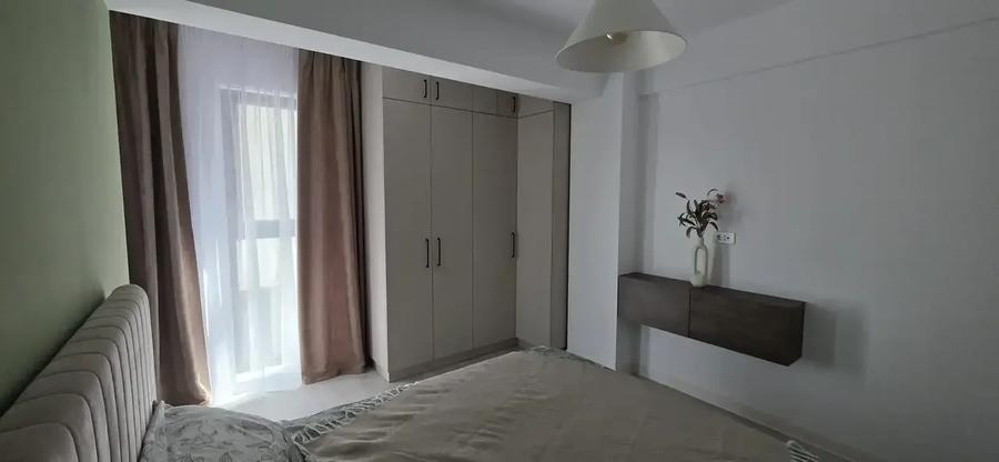 Apartament cu 2 camere semidecomandat, mobilat în Central