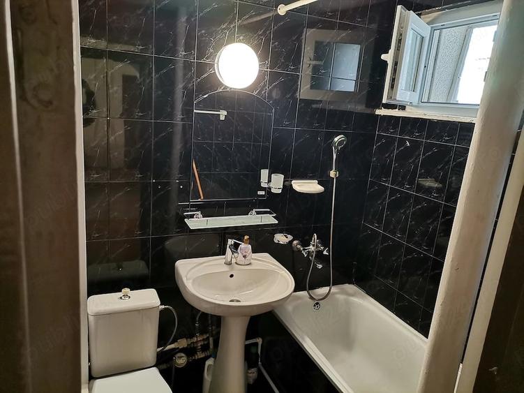 Apartament cu 2 camere semidecomandat în Podu Roș