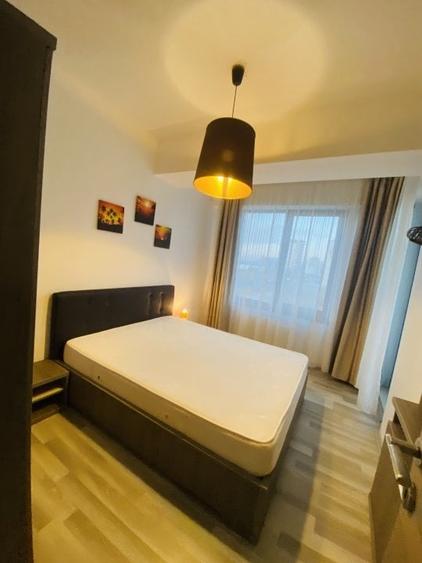 Apartament cu 2 camere semidecomandat, mobilat în Central