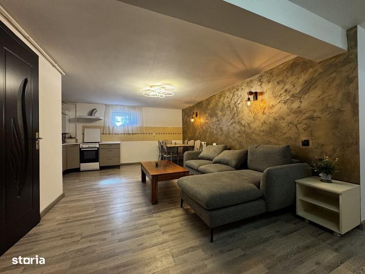 Apartament cu 3 camere semidecomandat în Borhanci