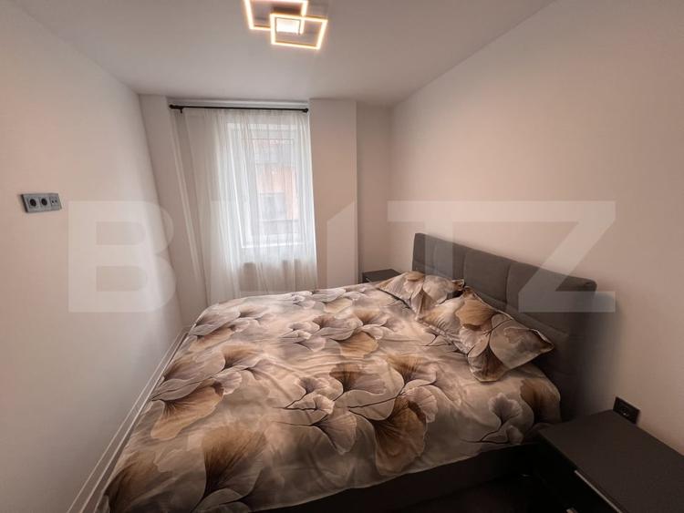 Apartament cu 3 camere semidecomandat, mobilat în Chinteni