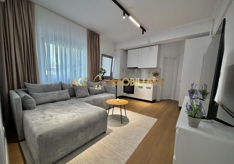 Apartament cu 2 camere semidecomandat, mobilat în 1 Mai