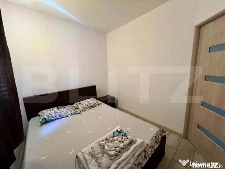 Garsoniera, 38 mp, AC si centrala proprie, parter, zona Cent - Craiova (Dolj) - 2