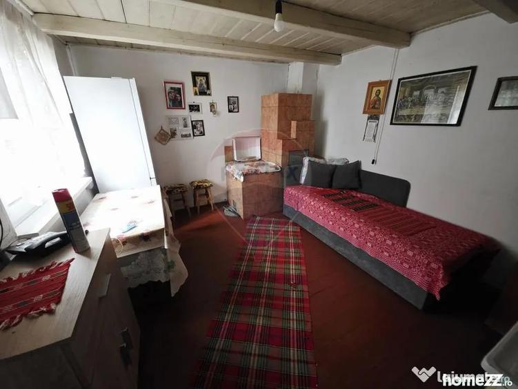 Casă cu 4 camere cu Teren 1677 Mp în Slobozia (Roznov)