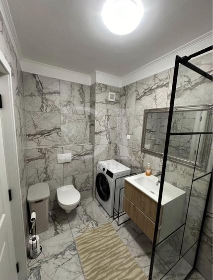 Apartament cu 2 camere semidecomandat, mobilat în Florești
