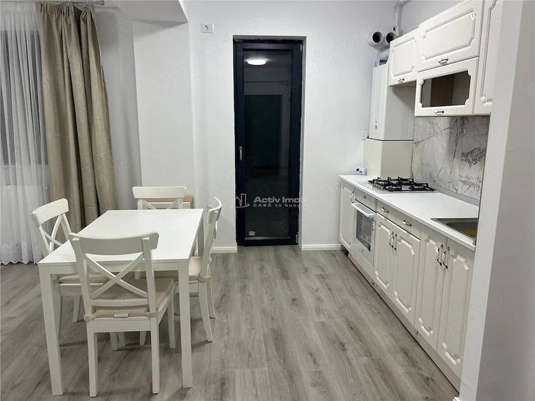 Apartament cu 3 camere semidecomandat în 1 Decembrie
