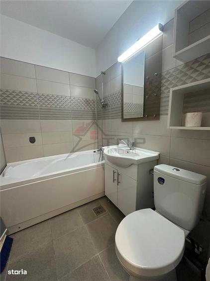 Apartament cu 2 camere semidecomandat, mobilat în Podu Roș