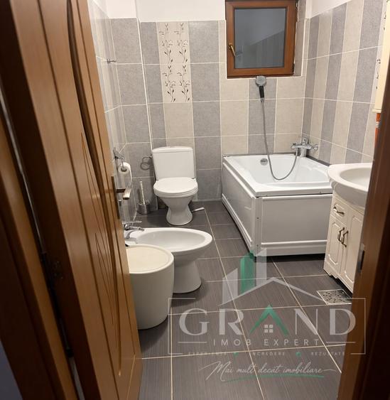 Apartament cu 2 camere semidecomandat, mobilat în Baciu