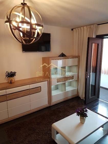 Apartament cu 2 camere semidecomandat, mobilat în Dorobanți