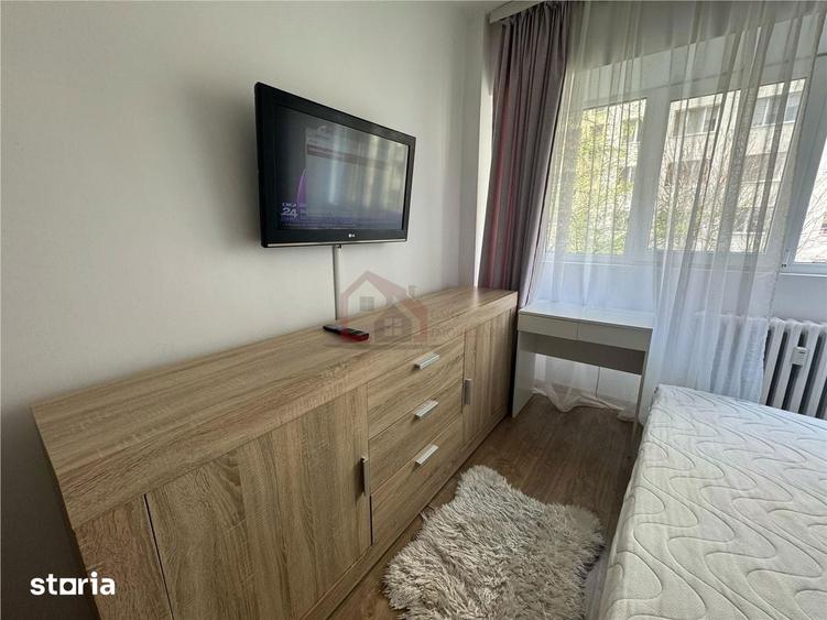 Apartament cu 2 camere semidecomandat, mobilat în Tei