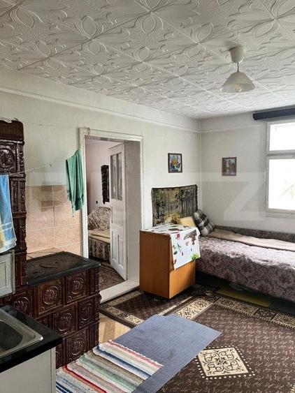 Casă individuală cu 2 camere cu Teren 714 Mp în Siret