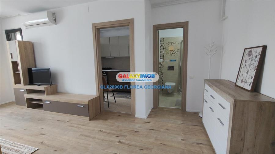 Apartament cu 3 camere semidecomandat, mobilat în Băneasa