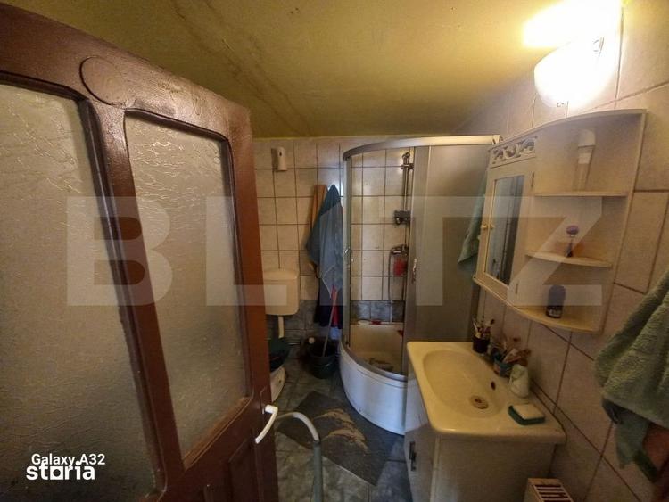 Casă cu 4 camere cu Teren 2500 Mp în Central