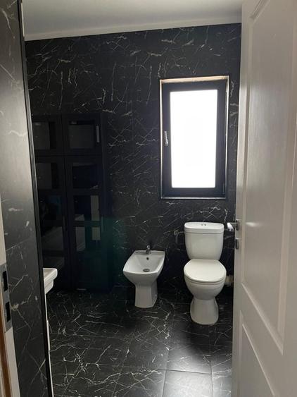 Casă cu 4 camere în Tunari