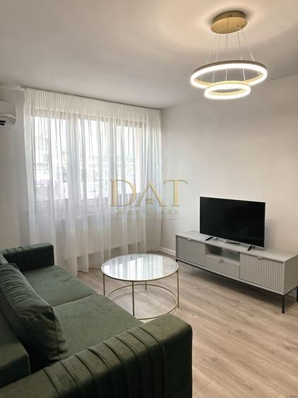 Apartament cu 2 camere semidecomandat, mobilat în Central