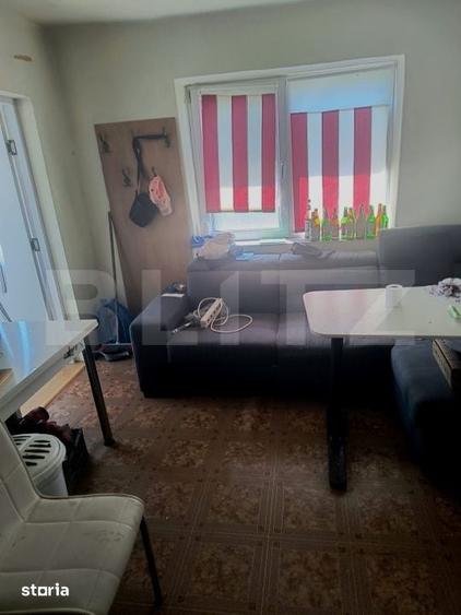 Casă cu 2 camere cu Teren 2000 Mp în Central
