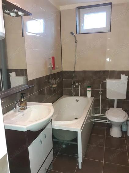 Casă cu 8 camere cu Teren 1000 Mp în Central