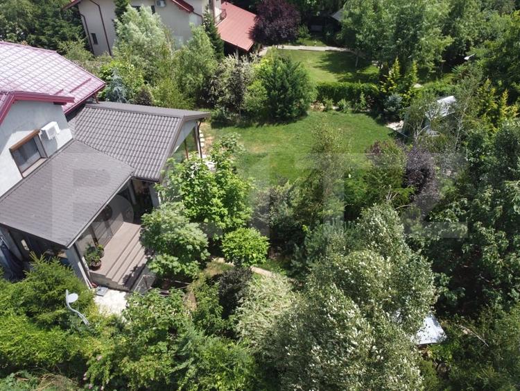 Casă individuală cu 6 camere cu Teren 1170 Mp în Exterior Sud