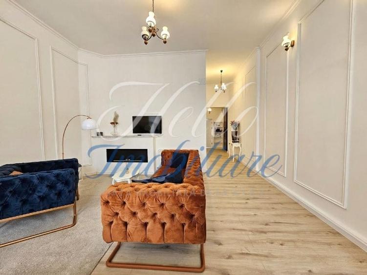 Apartament cu 3 camere semidecomandat, mobilat în Central