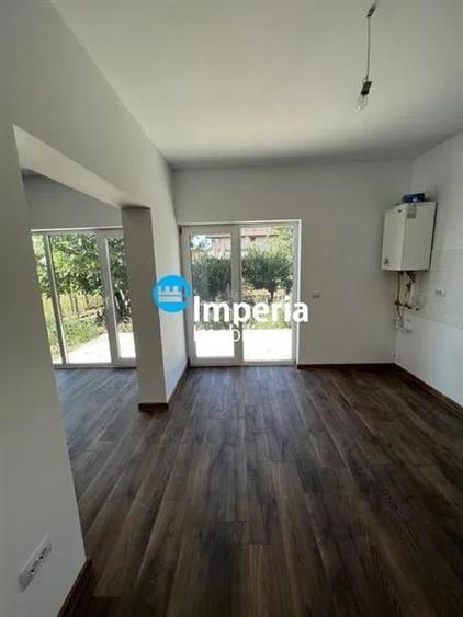 Casă individuală cu 4 camere cu Teren 500 Mp în Bucium