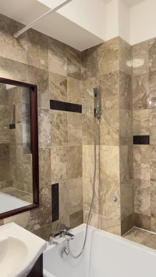 Apartament cu 2 camere semidecomandat, mobilat în Central