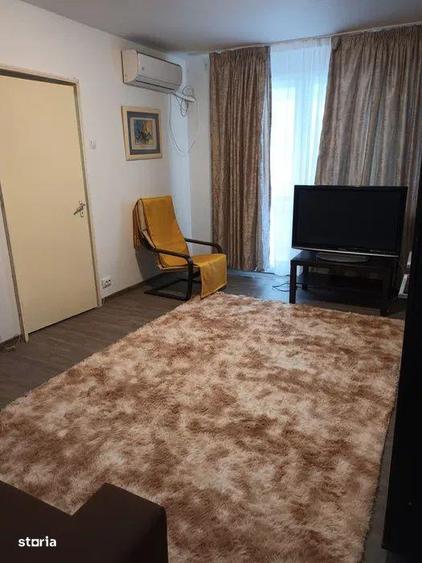 Apartament cu 2 camere semidecomandat, mobilat în Titan