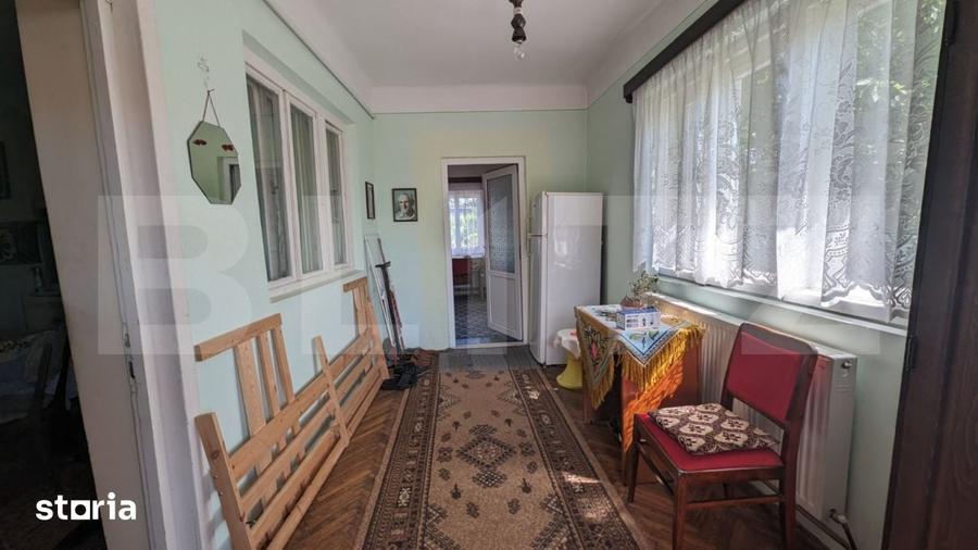 Casă cu 2 camere cu Teren 1100 Mp în Central