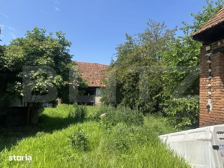 Casă cu 4 camere cu Teren 1200 Mp în Central