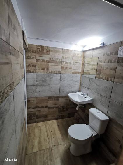 Casă cu 4 camere cu Teren 1000 Mp în Central