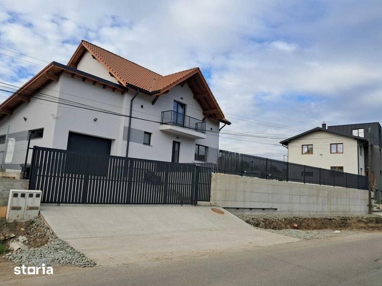 Casă cu 5 camere cu Teren 1000 Mp în Baciu