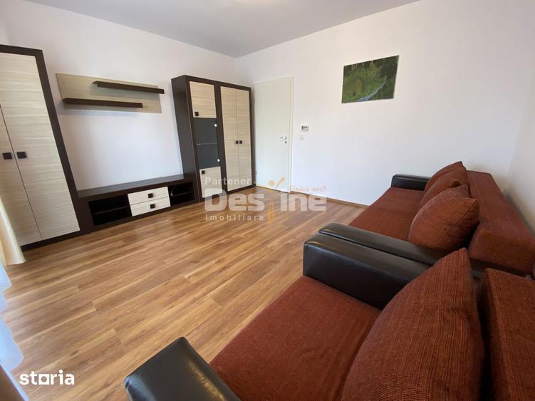 Garsoniera situata la etaj intermediar, cu balcon si loc de parcare, A - 1