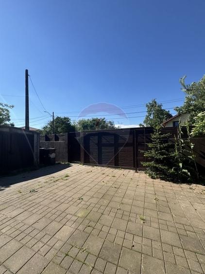 Casă individuală cu 6 camere cu Teren 260 Mp în Tunari