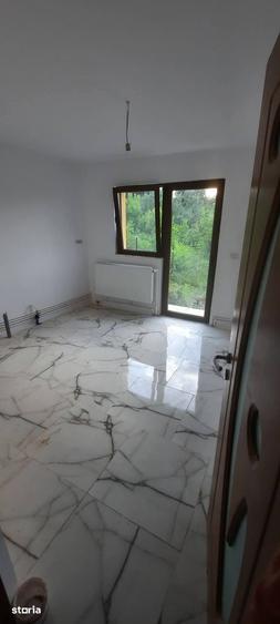 Casă cu 4 camere cu Teren 600 Mp în Voinești