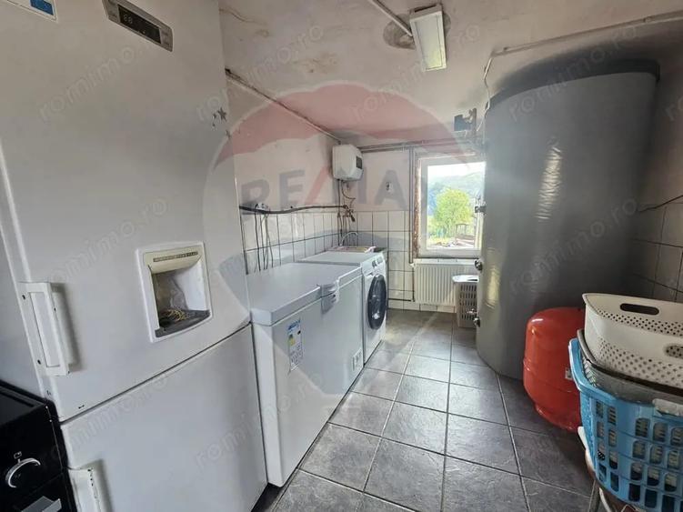 Casă cu 4 camere cu Teren 1371 Mp în Crivina