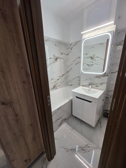 Apartament cu 2 camere decomandat în Calea București